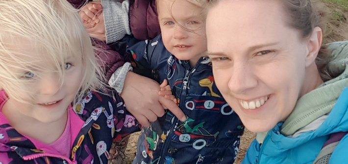 A woman and twin girls