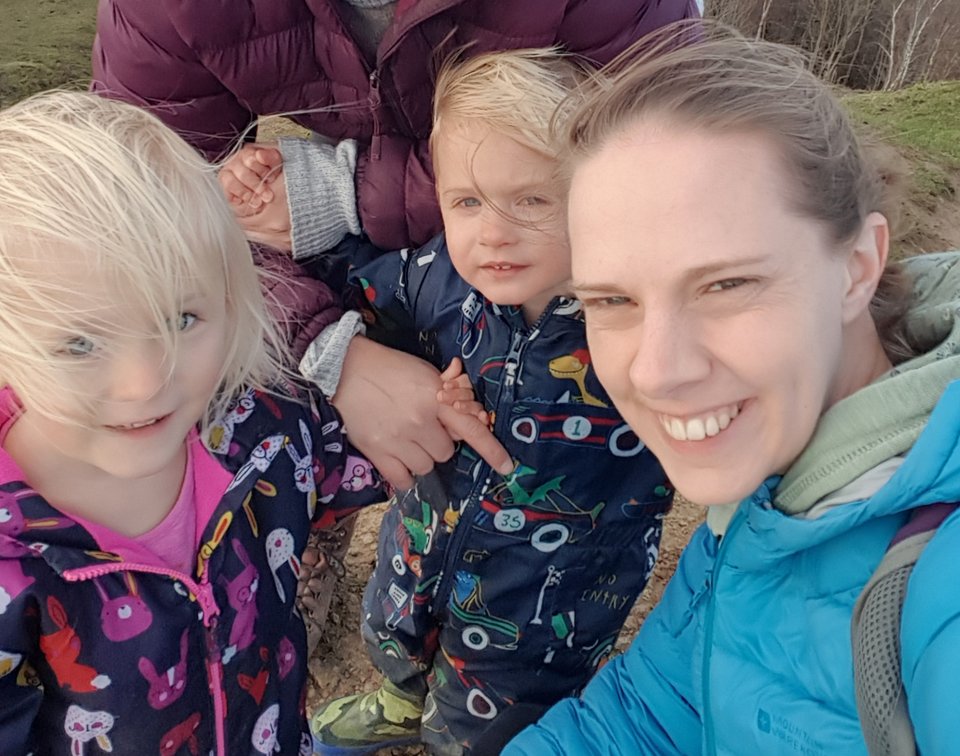 A woman and twin girls