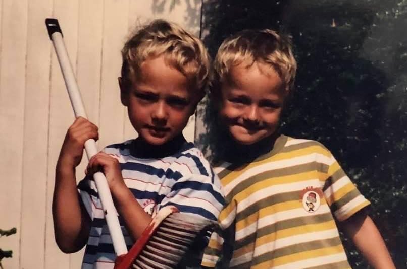 Twin boys pose together