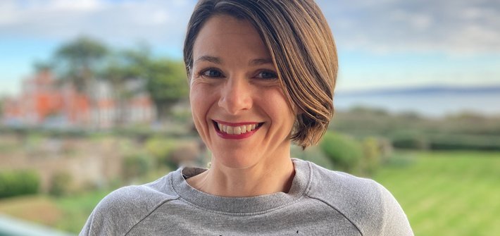 Pen picture of a women taken in front of a lawn