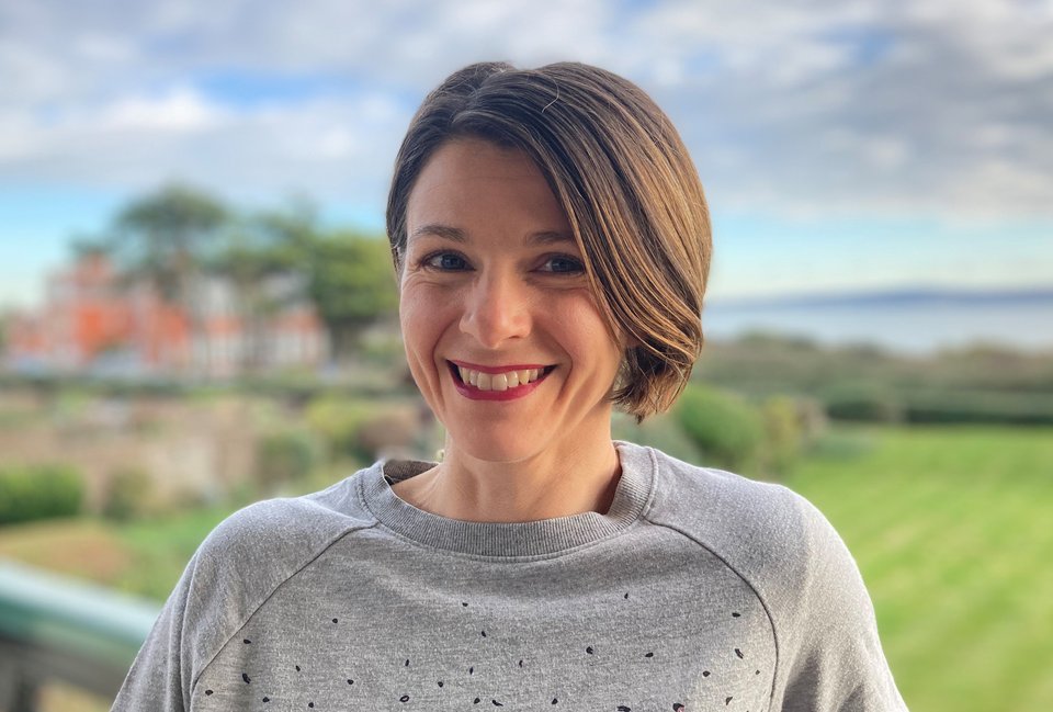 Pen picture of a women taken in front of a lawn